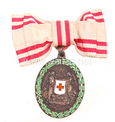 Österreich / K.u.K. Monarchie Ehrenzeichen vom Roten Kreuz bronzene Ehrenmedaille mit Kriegsdekoration