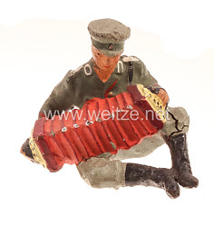 Lineol - Heer Lagerleben - Soldat sitzend Ziehharmonika spielend