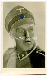 Waffen-SS Portraitfoto, SS-Unterscharführer mit Knautschmütze