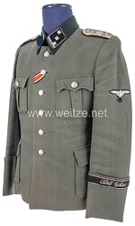 Waffen-SS Feldbluse eines SS-Obersturmführers im SS Panzer-Grenadier-Regiment 1 bzw. 2  der 1. SS-Panzer-Division  "Leibstandarte SS Adolf Hitler"
