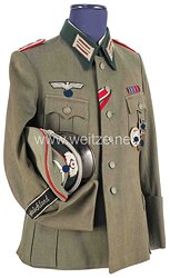 Wehrmacht Feldbluse und Schirmmütze eines Oberleutnants im Artillerie-Regiment der Division "Großdeutschland"