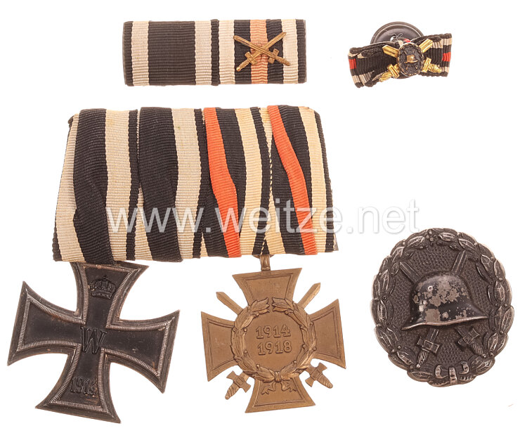 Ordenschnalle und Verwundetenabzeichen eines Soldaten im 1. Weltkrieg