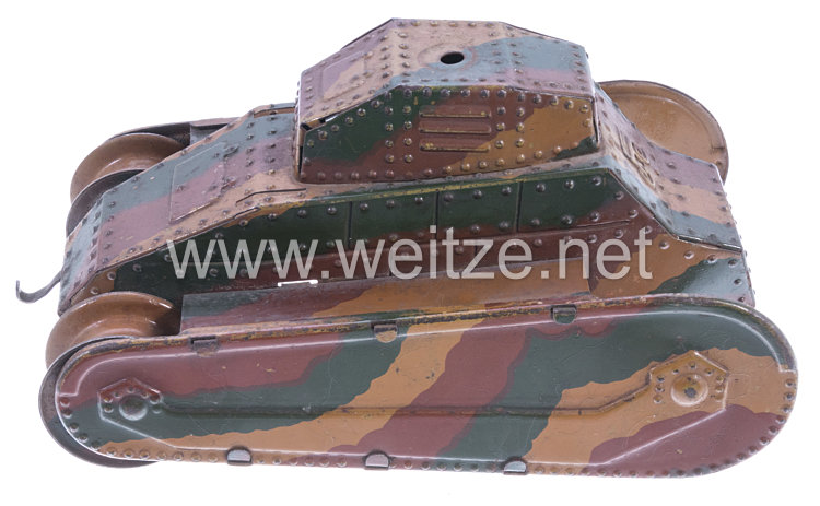 Blechspielzeug - Panzer in Mimikri-Tarnung ( Tank des 1. Weltkrieges )